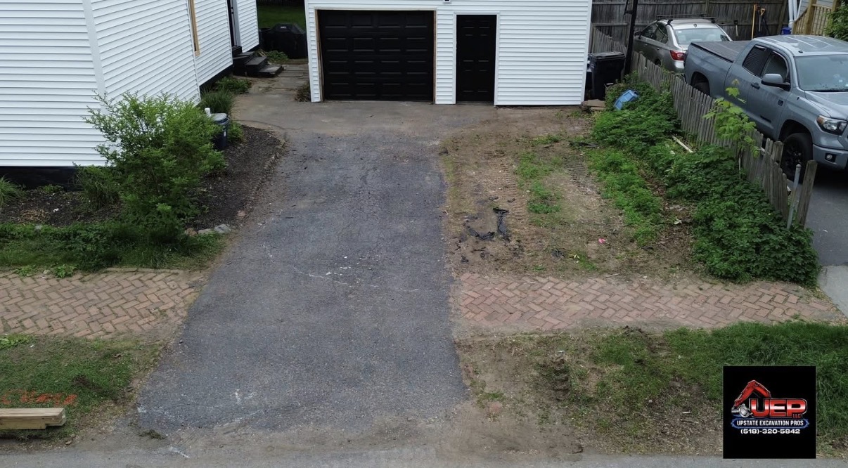 Driveway Expansion & Gravel Installation — before photo